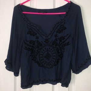 Embroidered navy blouse